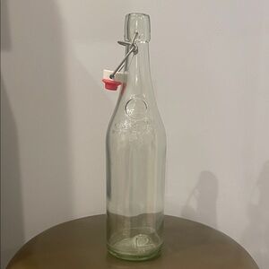 Vintage glass bottle with clasp stopper